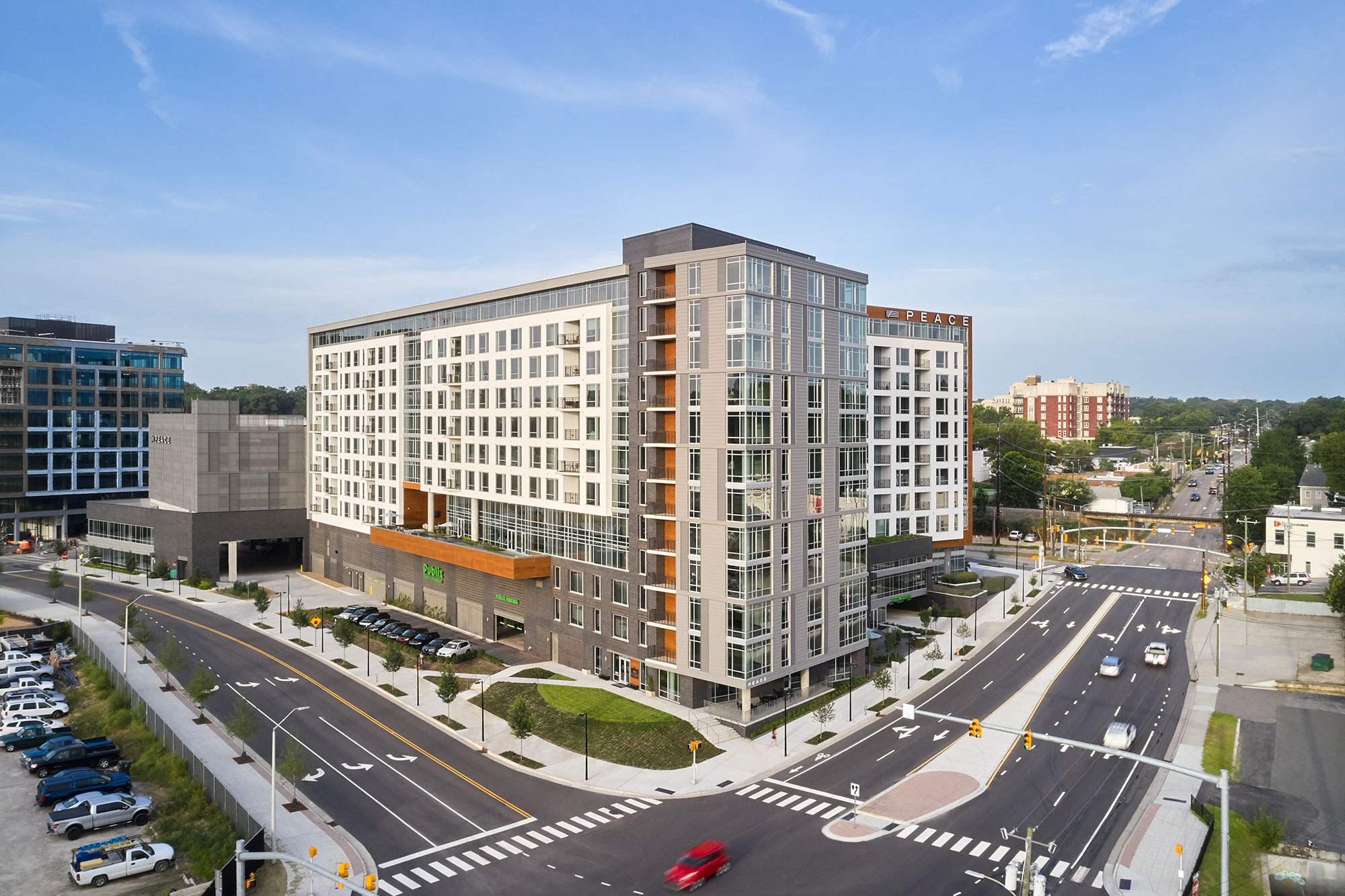 Corner shot of exterior of Peace Raleigh Apartments