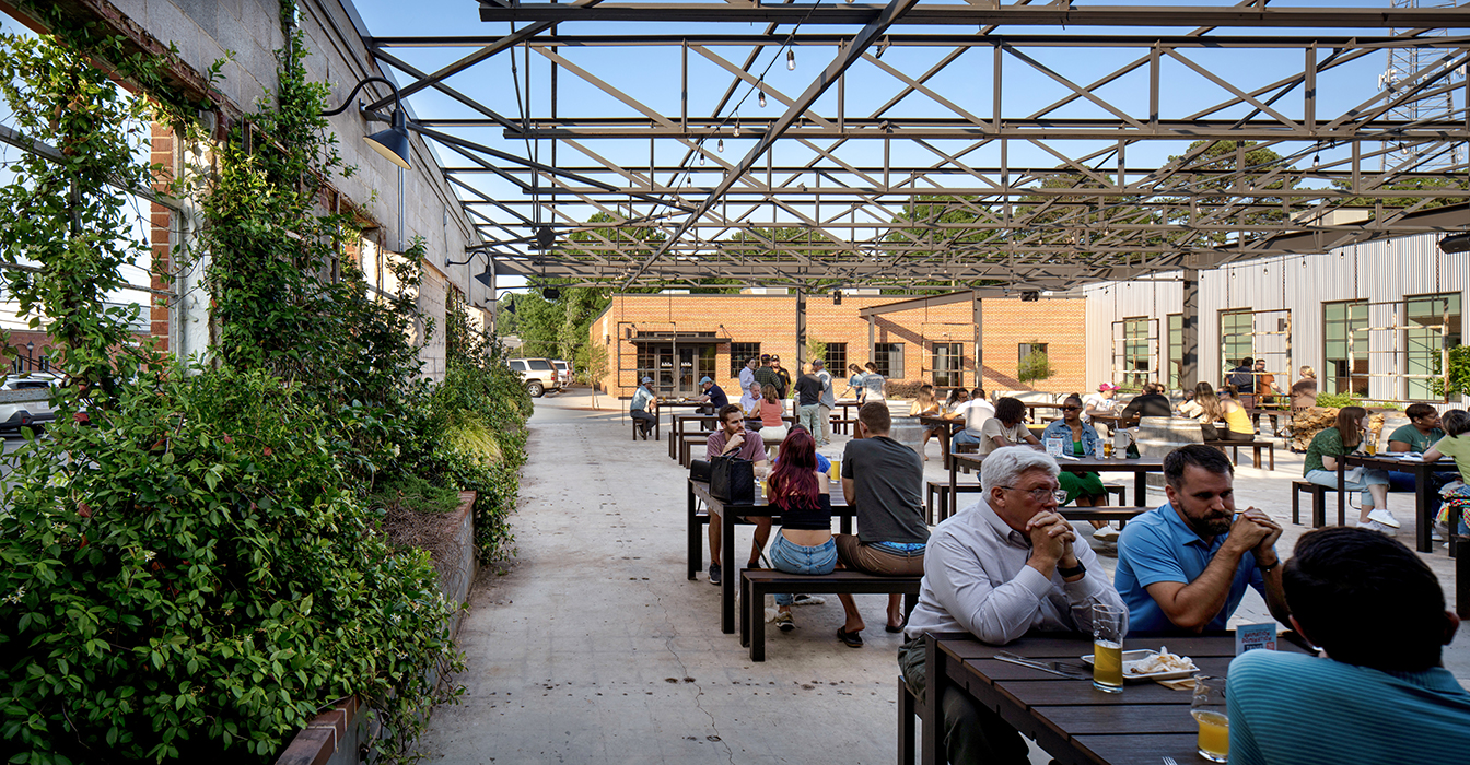 Legion Brewing patio with people eating, socializing