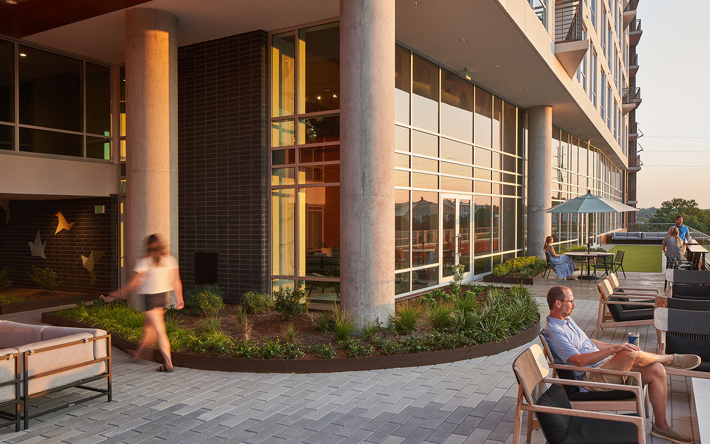 Peace residents enjoying outdoor rooftop terrace