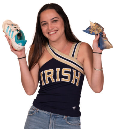 Tia Garrison dressed in Notre Dame cheer gear