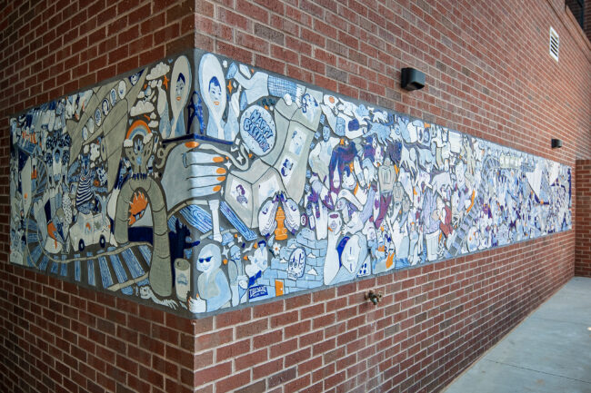 Corner mural cut into wall